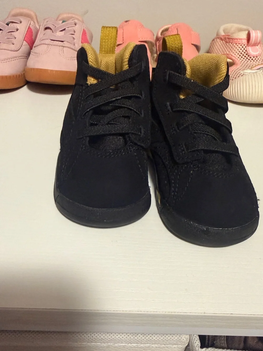 Nike Kids Black and Gold Low-Top Sneakers